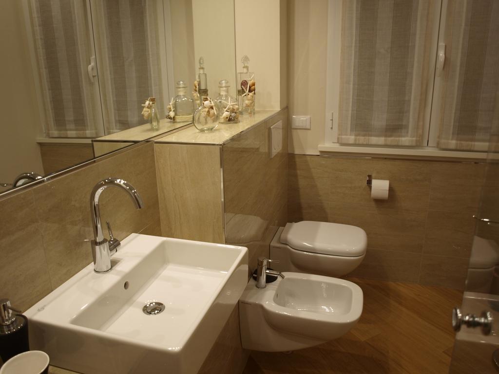 Il Pontile Holidays Apartment Marina di Pietrasanta Pokoj fotografie